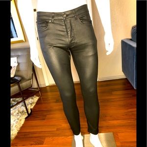 Mens Black skinny coated jeans.